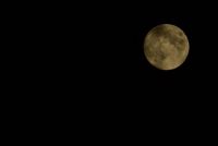 eclipse waiting in cloudy sky